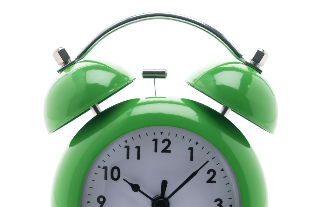 Wekker. Fase 1 van RSI symptomen. Alarm slaan bij de eerste klachten.